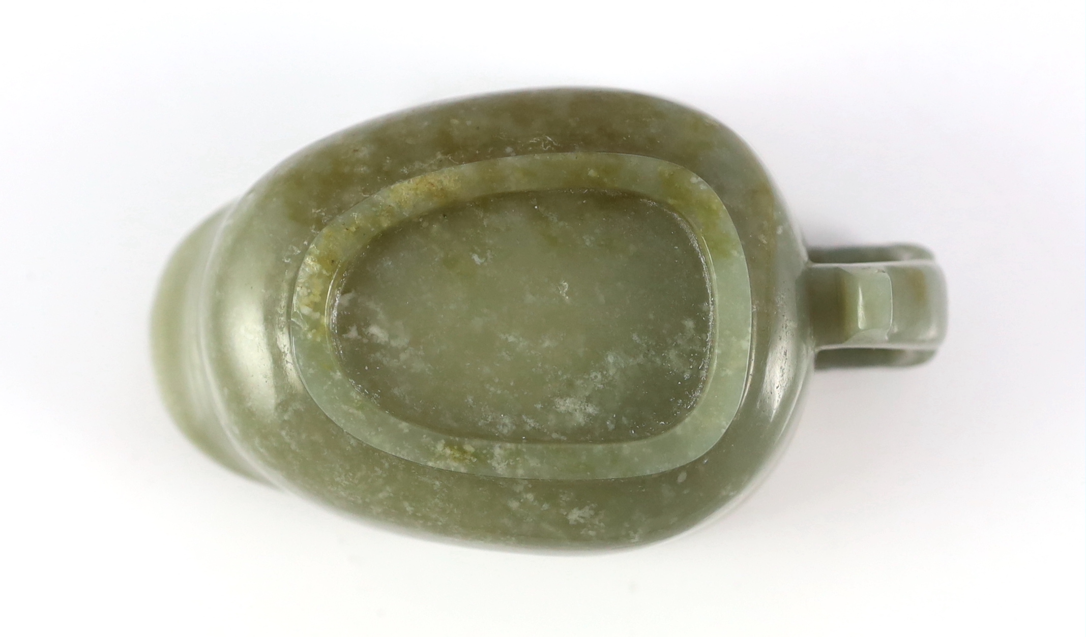 A Chinese celadon jade pouring vessel, yi, 17th/18th century